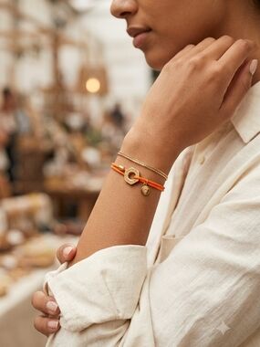 Marc by Marc Jacobs Cord Bracelet in orange w/ gold-tone hardware